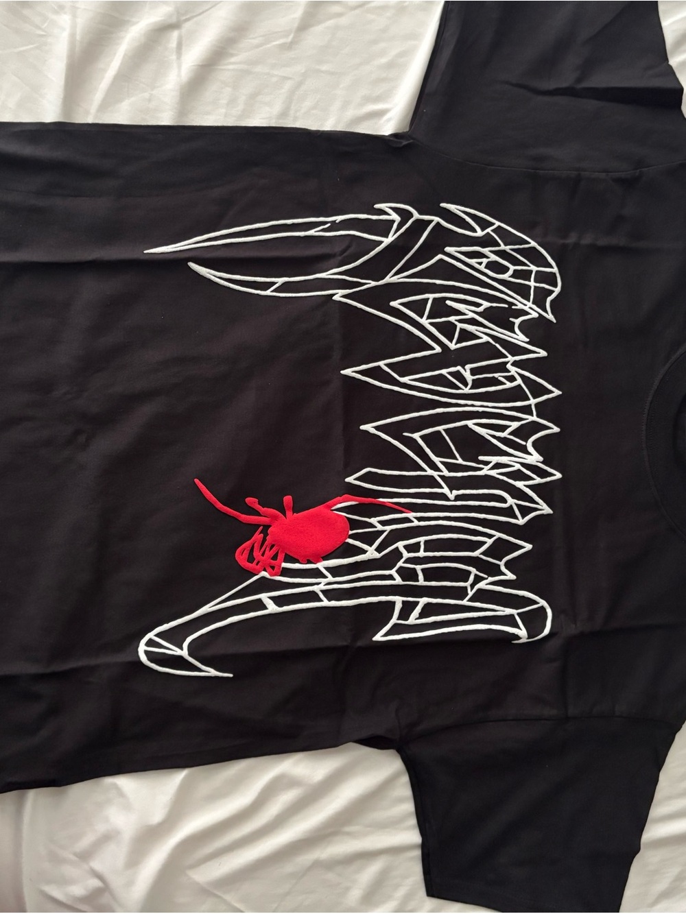 Revenge Clothing Black Tee with White Logo and Red Spider Patch